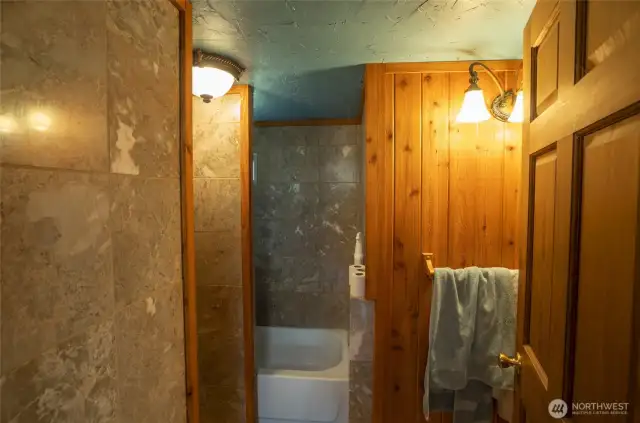 Full bath with tile shower