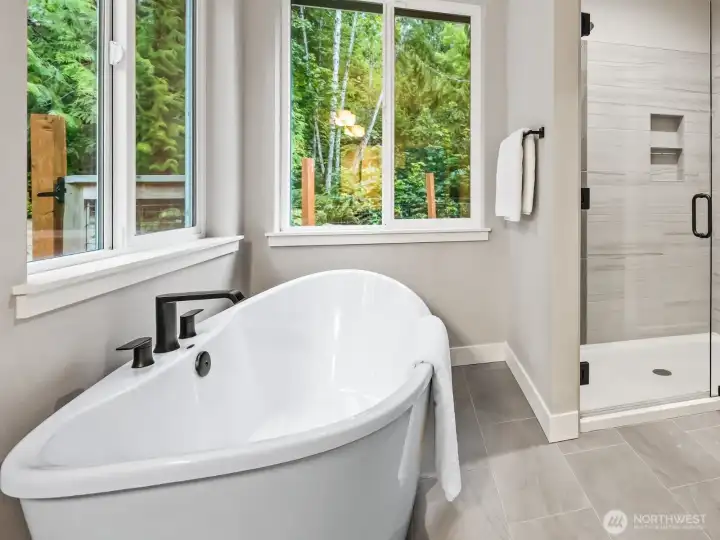 Luxury primary bath with HUGE soaking tub.