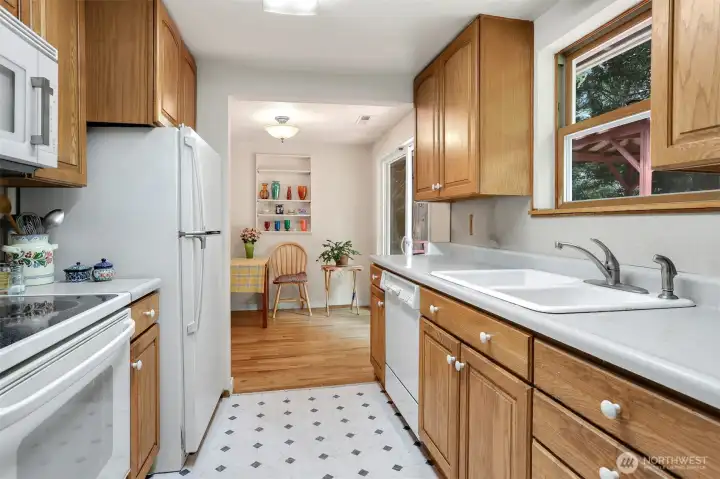 Kitchen looking out on deck & Back yard.