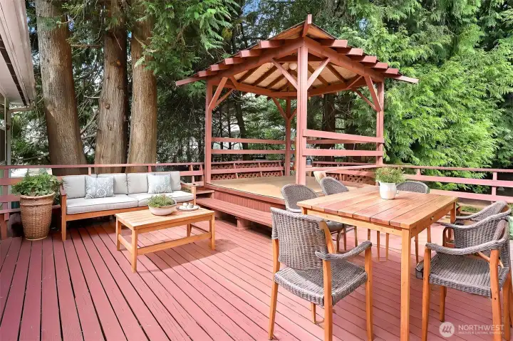 Large deck with covered area. (Virtually Staged)