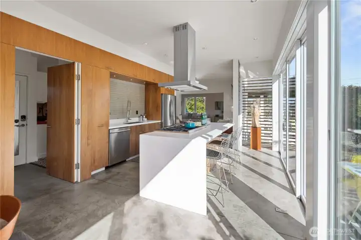 Behind the great room area is the butler's pantry & a powder room