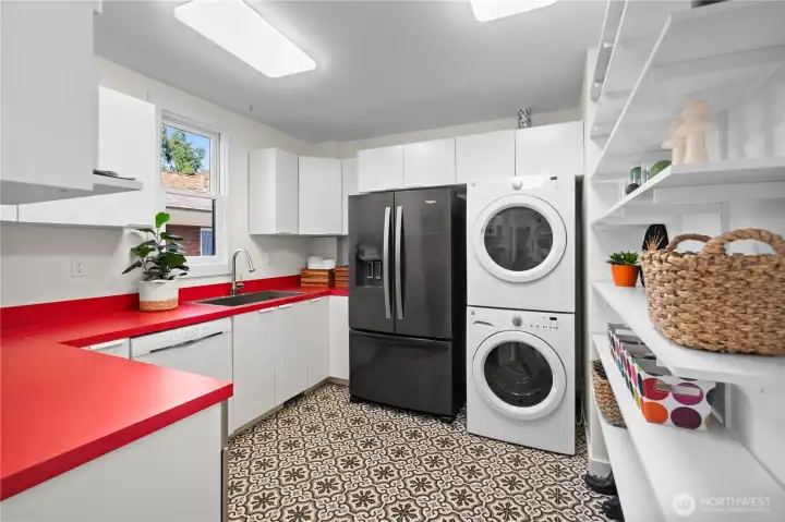 Butler's pantry has additional appliances, laundry, lots of storage, and makes a great mudroom (adjacent to the back exterior entry).