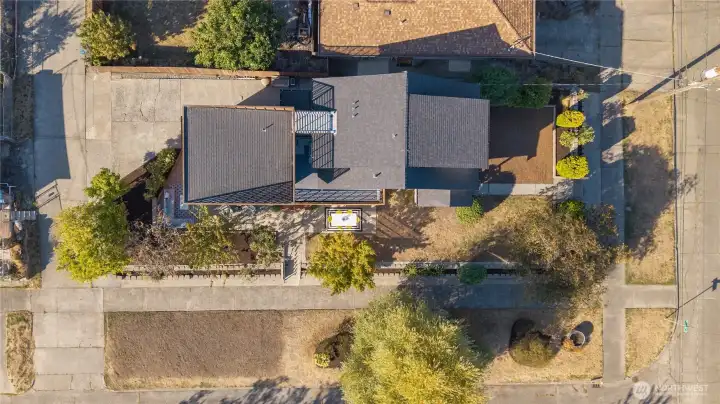Birdseye view of the large lot. Huge parking strip makes the lot feel double the size!