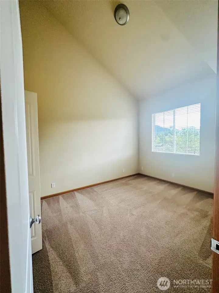 Primary room features vaulted ceilings which not all townhomes of this type have