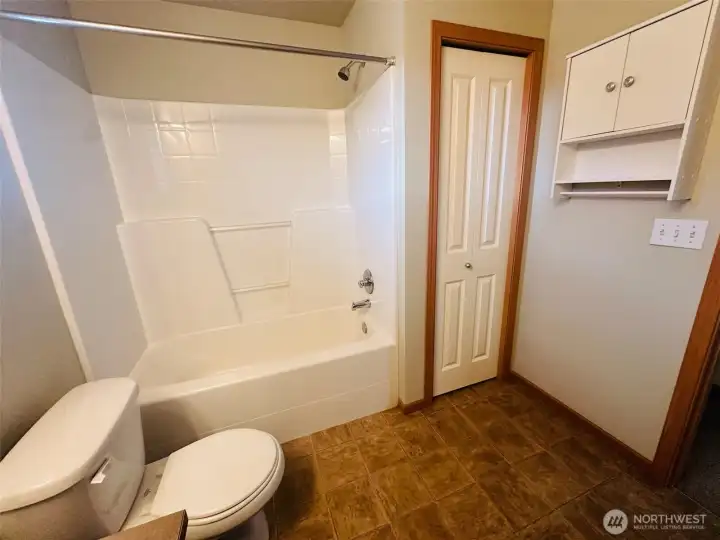 More storage in linen closet