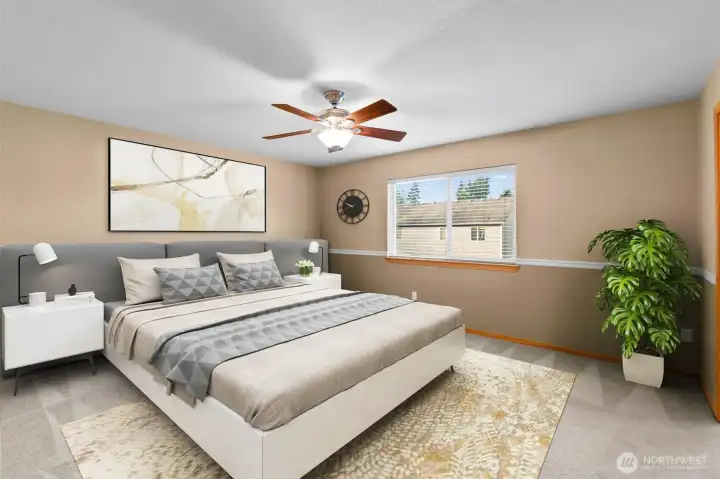 This is the large upstairs primary bedroom. (photo is virtually staged).