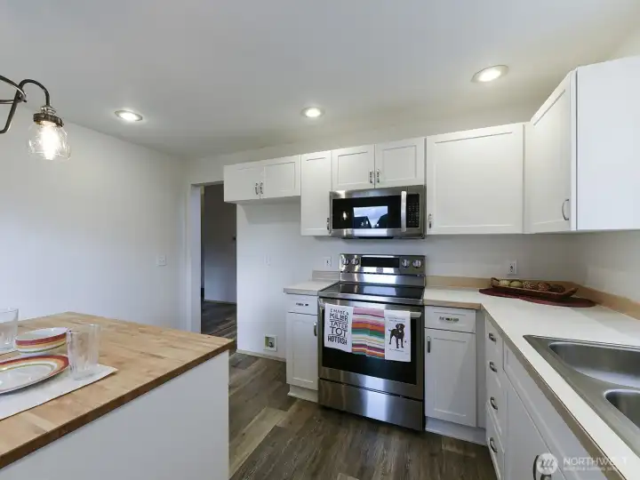 View from slider.  Entrance shown goes to living room and stairs.