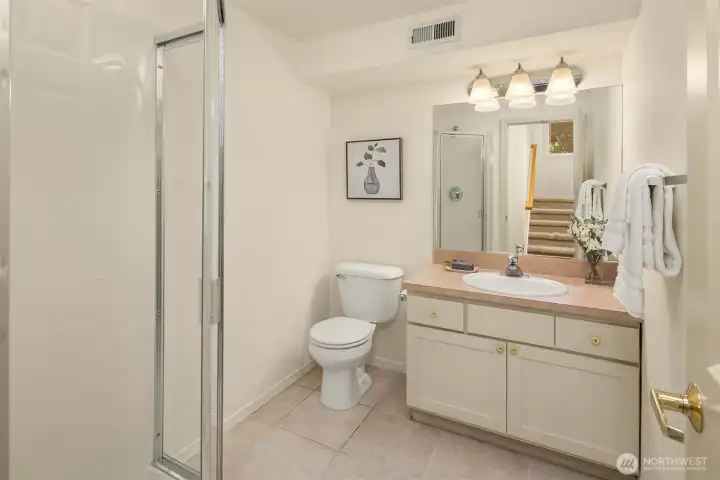 3/4 bath just outside the bedroom door