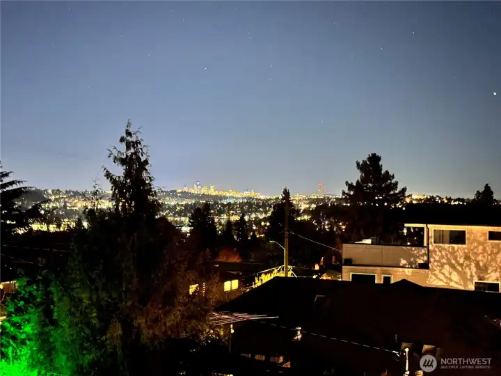 View potential from future third floor.  Looking NW. This wide angle shot pushes the city away from the lens. Next photo pulls it back in for how the distance experienced visually on site.