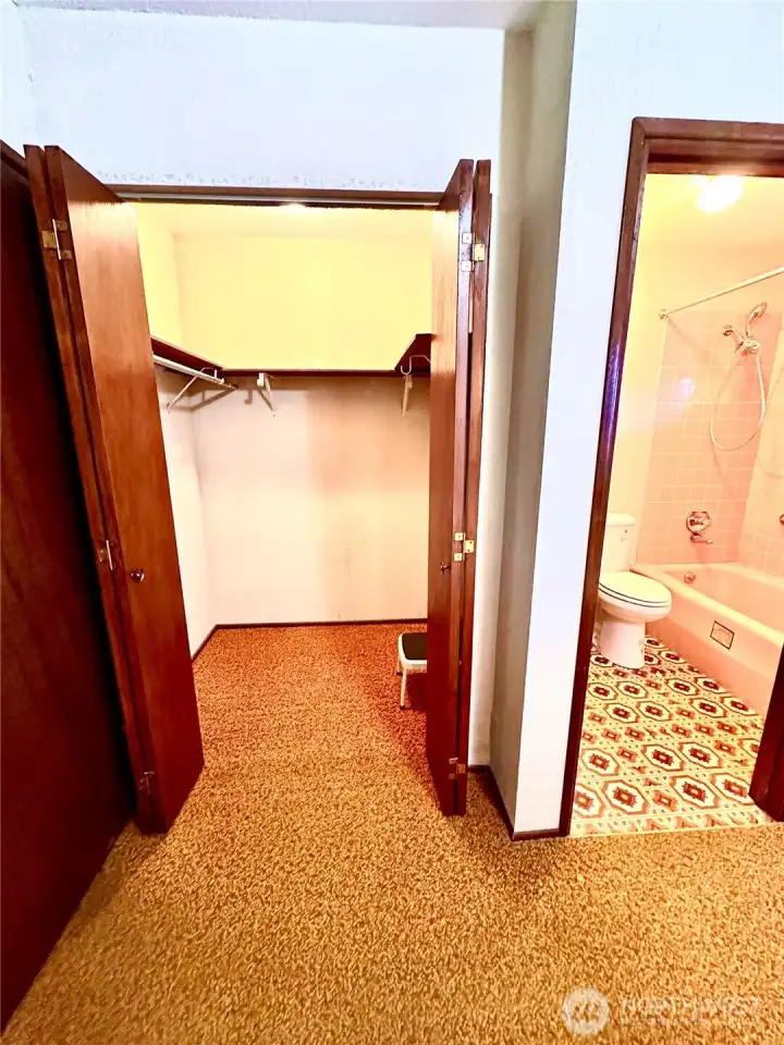 Primary walk-in closet and bath.