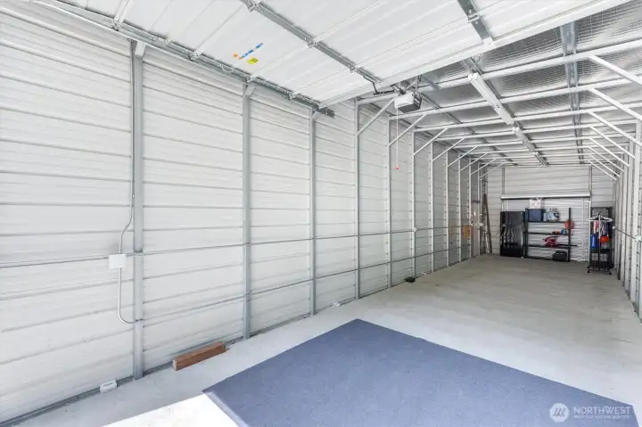 Garage is large enough to hold a pontoon boat and extras