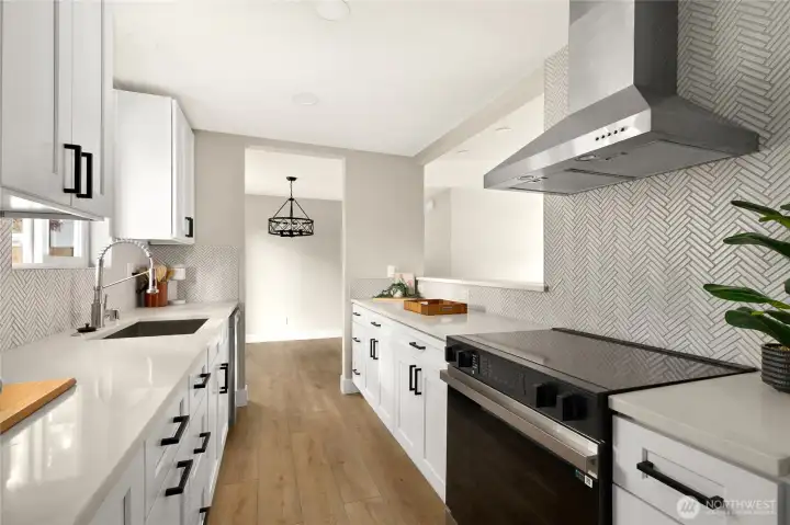 Expansive kitchen with loads of storage.