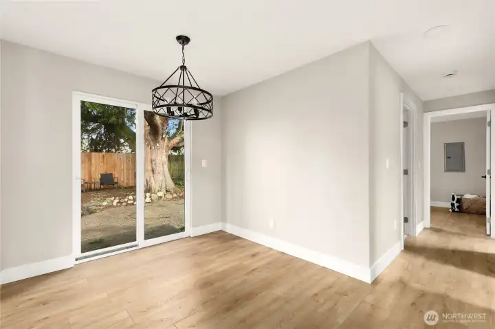 Extra eating space with access to rear yard space.