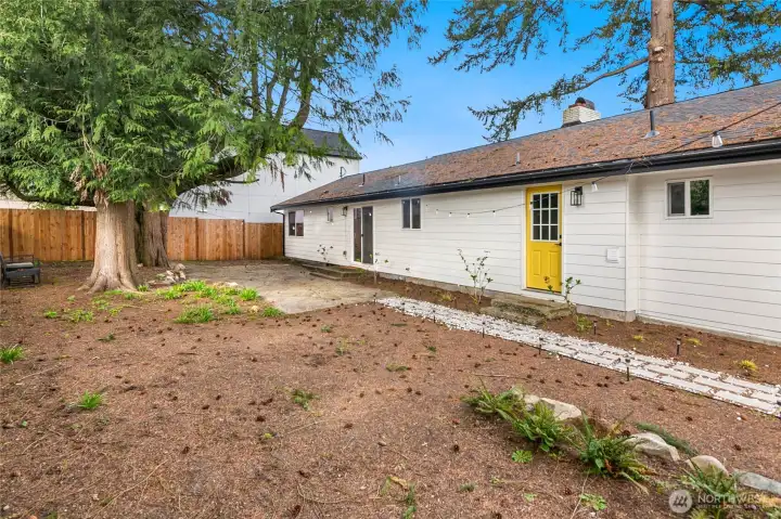 Beautiful, private rear yard space with multiple entertaining spaces.