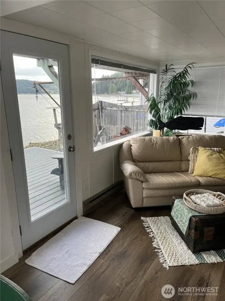 Step right out to the deck from living room.