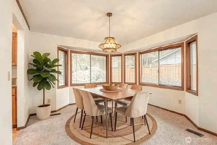 Plenty of natural light in this Dining Room (staged)