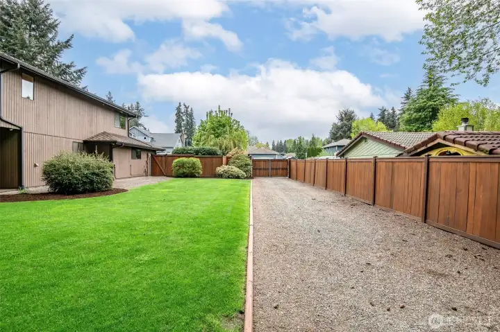 RV parking in side yard with double gate for easy access