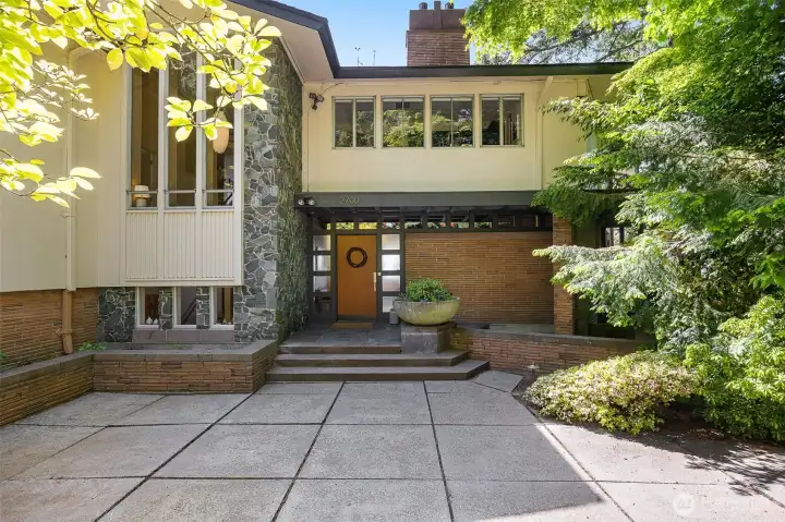 Front of house with courtyard and Mid-Century Modern features Front of house with courtyard and Mid-Century Modern features
