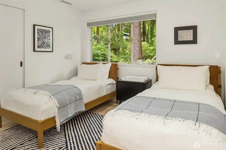 Kids bedroom with view of the grounds. Kids bedroom with view of the grounds.