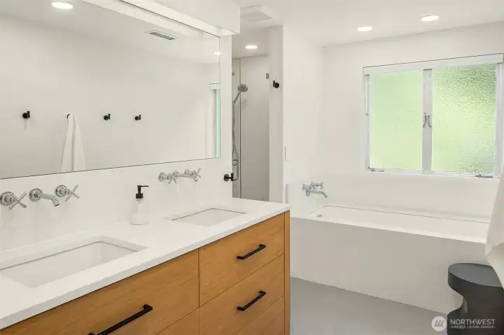 Kids ensuite full bathroom with heated floors, double sinks and separate shower and bathtub. Kids ensuite full bathroom with heated floors, double sinks and separate shower and bathtub.