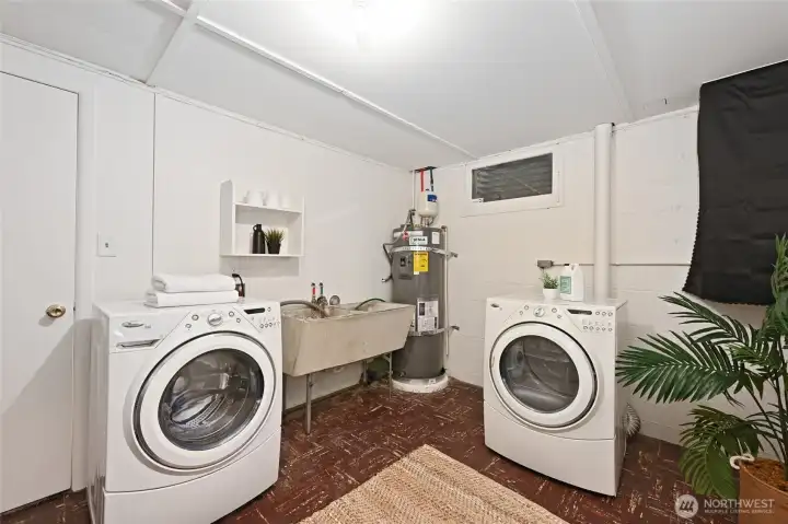 Brand new water heater and large functional laundry