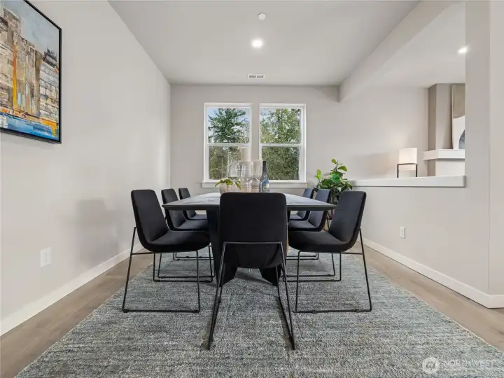Dining room to gather in. Pictures are for representational purposes only. Finishes vary.