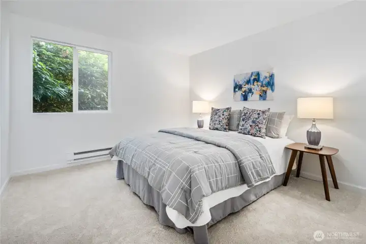 Spacious, private primary bedroom.