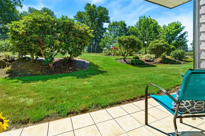 View from the tiled, back patio - perfect for morning coffee or tea, or your favorite afternoon beverage.