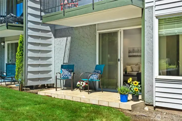 Back patio with room for a grill, direct sunlight for container garden.