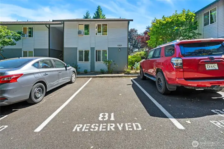 Reserved parking within steps of walkway to unit.
