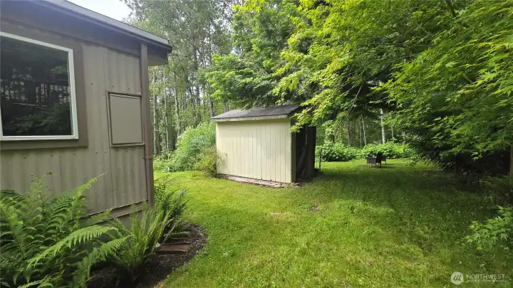 Green lawns and the storage shed