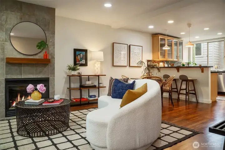 Open layout with dining, bartop seating and a kitchen with courtyard views and plenty of storage. Open layout with dining, bartop seating and a kitchen with courtyard views and plenty of storage.