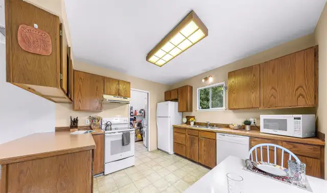Large kitchwen with tons of storage an opportunity should you choose to remodel.