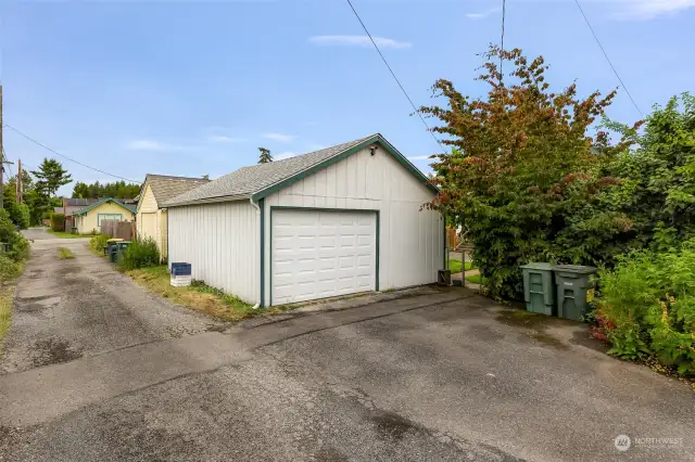 Oversized 1 car garage off of the alley has additional storage/workspace and could potentially be a detached ADU (Buyer to verify).