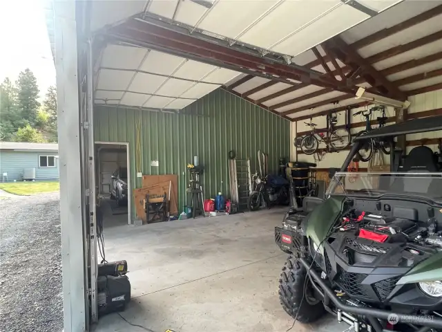 garage door opens to now enclosed shop area