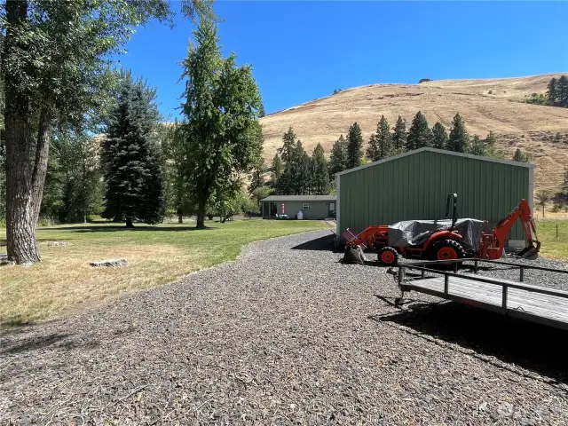 view from river towards house and shop