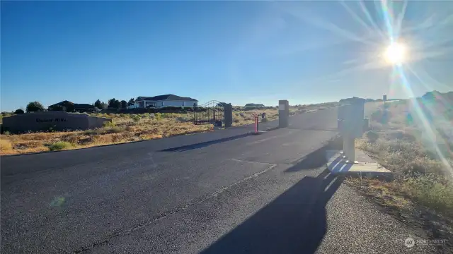 Gated enterance into Desert Hills Community, First Lot on the Right Mailboxes on the right.