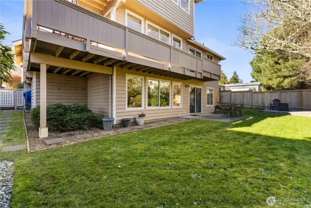 Backyard showing entry stairs to apartment.