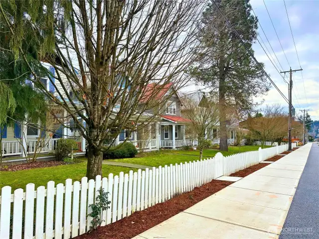 The picket fenced Madison Cottages Community has 21 homes.