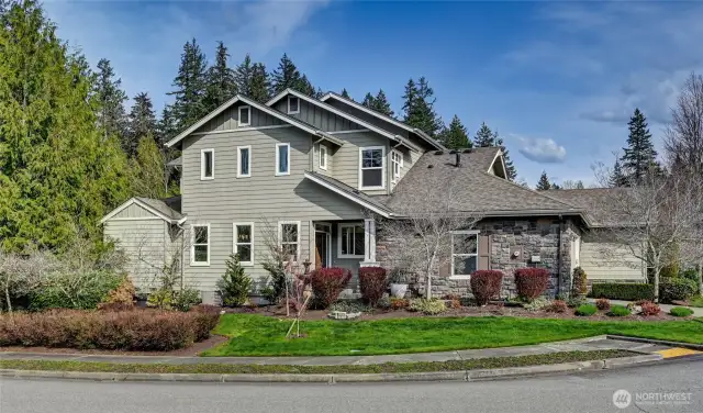 Set on a corner lot this Washington Plan offers flexible spaces for the owners.