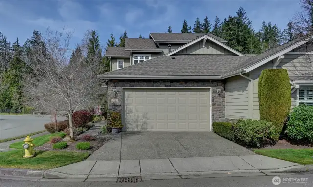 The two car garage has nice storage space and there is good driveway parking for guests.