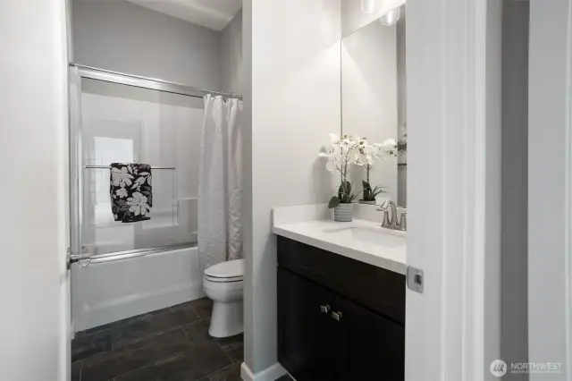 Full bath on main level across from main floor bedroom.