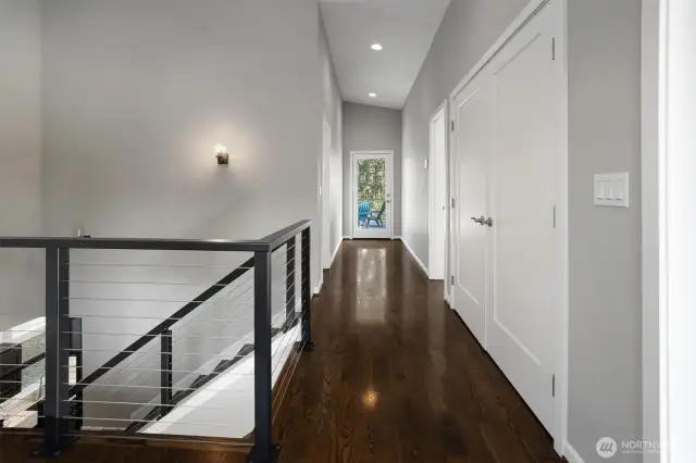 Spacious upstairs hallways, well thought-out for moving your furniture in! :) Note the solid hardwood floors.