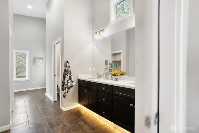 Primary bath, the under cabinet lighting is great for those night time visits to the bathroom :)