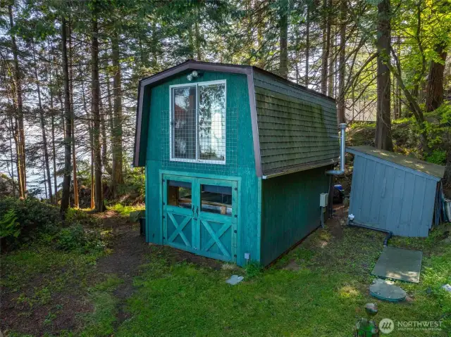 Shed with Swim in Place pool and upper room with shower. Perfect for a gym.