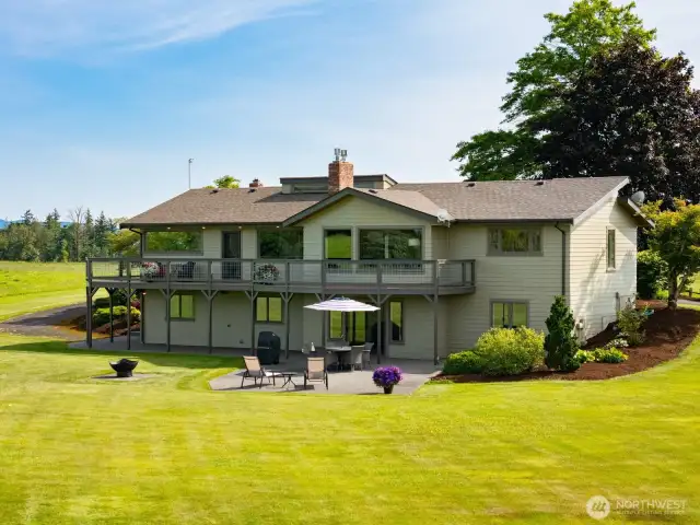 Relax and enjoy the expansive deck and patio