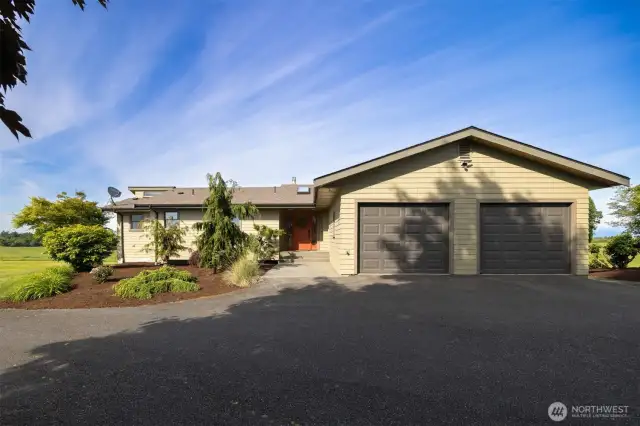 After a peaceful private drive, you pull up to your main level living.