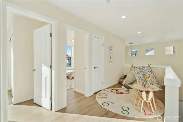 Upstairs loft area with linen closet