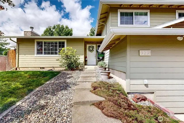 Front Entry. Raingutters all around the home.