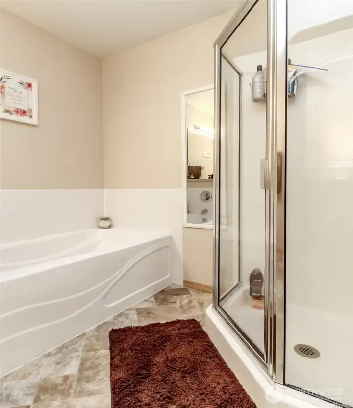 Soaking tub and separate shower in the primary bathroom Soaking tub and separate shower in the primary bathroom